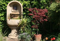 Enjoy the soothing sounds of the garden’s water feature